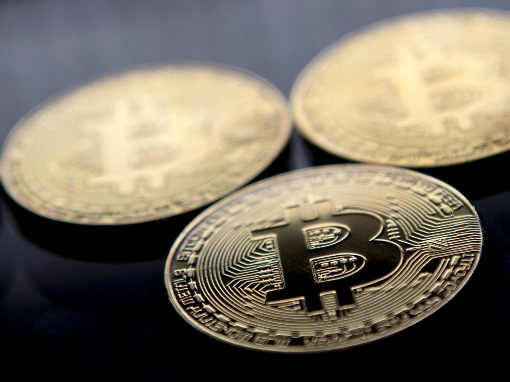 Many remain bullish on Bitcoin’s prospects. (Photo by Justin TALLIS / AFP)