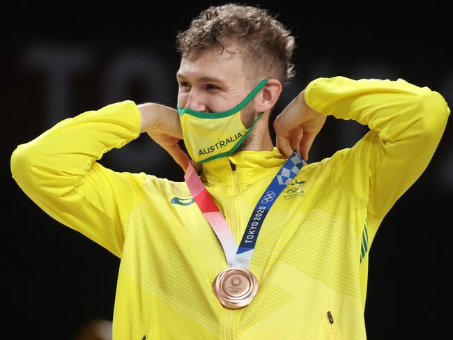 SAITAMA, JAPAN - AUGUST 07: Jock Landale of Team Australia celebrates with his bronze medal during the Men's Basketball medal ceremony on day fifteen of the Tokyo 2020 Olympic Games at Saitama Super Arena on August 07, 2021 in Saitama, Japan. (Photo by Gregory Shamus/Getty Images)