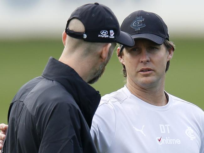 MELBOURNE, AUSTRALIA - NOVEMBER 06: David Teague, senior coach of Carlton speaks with Assistant coach Henry Playfair  during a Carlton Blues AFL training session at Ikon Park on November 06, 2019 in Melbourne, Australia. (Photo by Darrian Traynor/Getty Images)