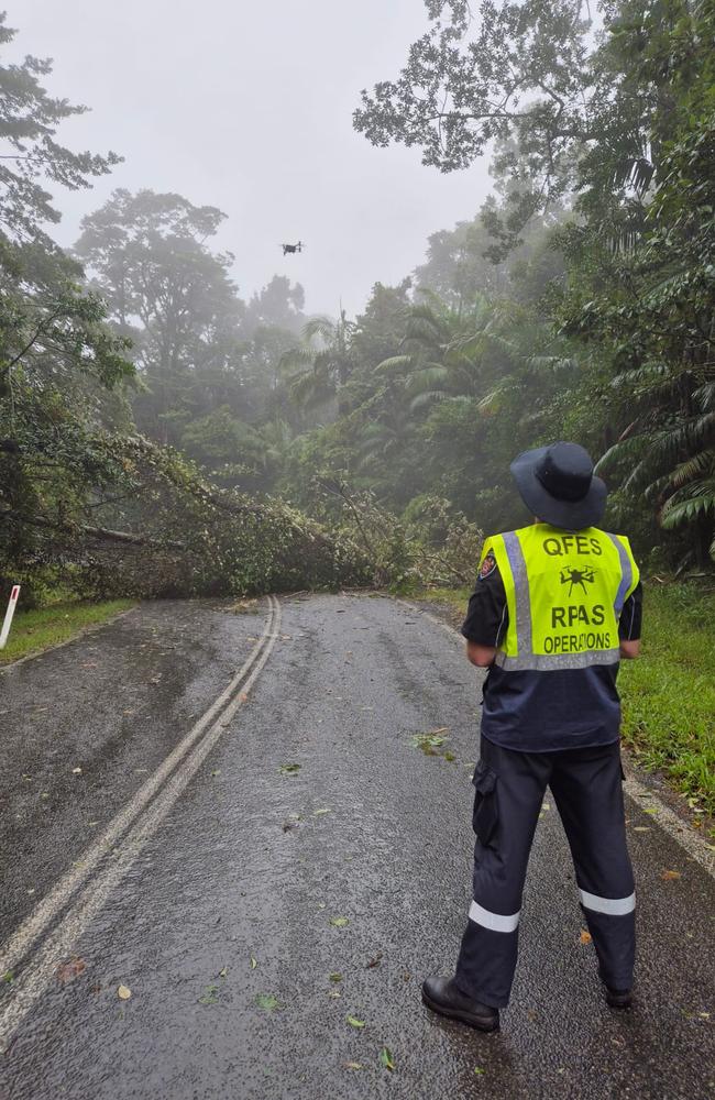 A Queensland Fire Department pilot operating a Remotely Piloted Aircraft Systems (RPAS), more commonly referred to as a drone, during response and recovery efforts in the ongoing North Queensland flood disaster. Picture: QFD