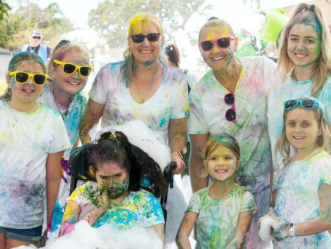 Alyssa Glover, Ella Glover, Melissa Gorrie, Sarah Glover, Charlotte Glover, Lauren Gorrie, Holly Glover and Hannah Glover from Habana at the Mackay Colour Run 2021. Picture: Michaela Harlow