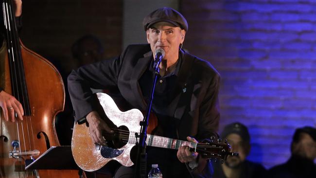 Musician James Taylor performs during a campaign event for Democratic presidential candidate Hillary Clinton in November. Picture: AP Photo/Steven Senne