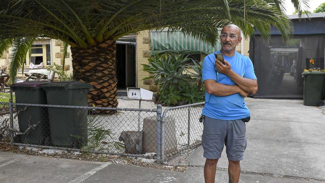 Hamid Tahmasebi outside his maisonette house, which was engulfed in flames from a fire that started in a neighbouring house. Picture: Mark Brake