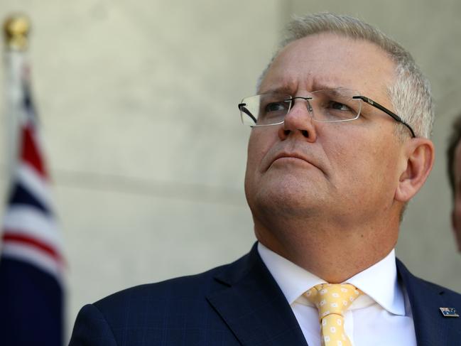 Prime Minister Scott Morrison with David Littleproud, Michael McCormack, Bridget McKenzie, and Dan Teehan during a press conference at Parliament House in Canberra. Picture Gary Ramage