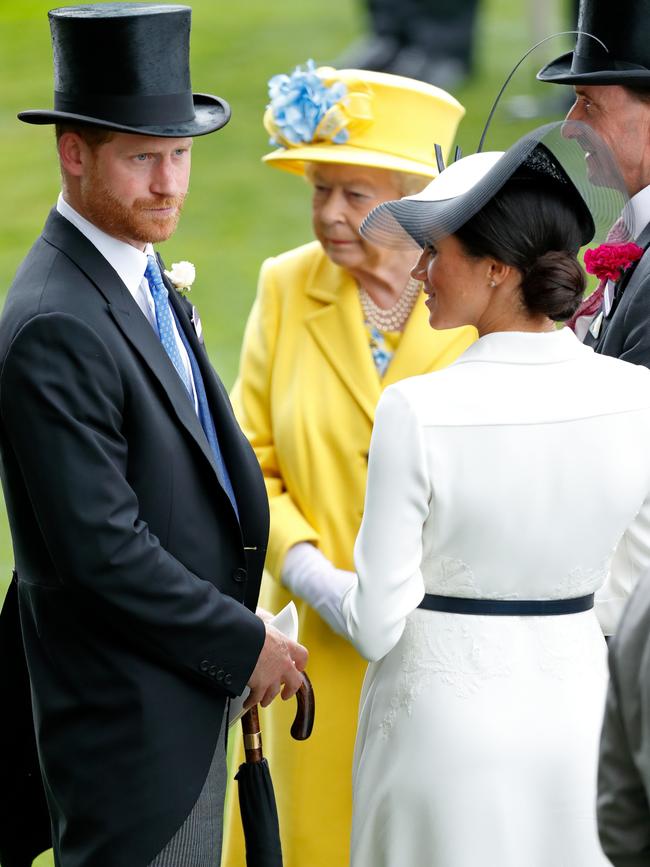 Prince Harry, and Meghan with the Queen at Ascot in 2018. Picture: Getty Images.