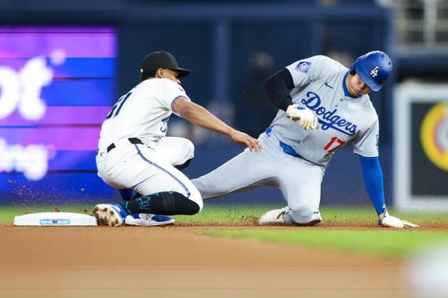 Shohei Ohtani steals second base against the Miami Marlins last month on his way to becoming the first player to hit 50 home runs and steal 50 bases in a single season -- a feat previously thought impossible