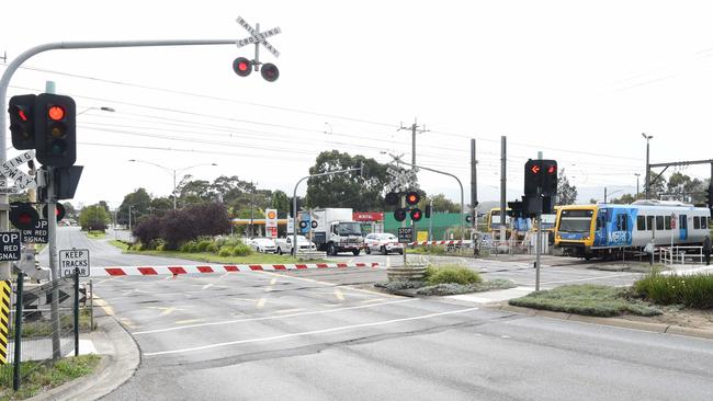 Before – the train crossing the Mountain Highway tracks.