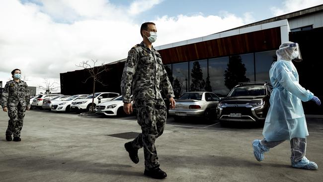 Military personnel support healthcare workers at Epping Gardens aged care facility. Picture: Getty