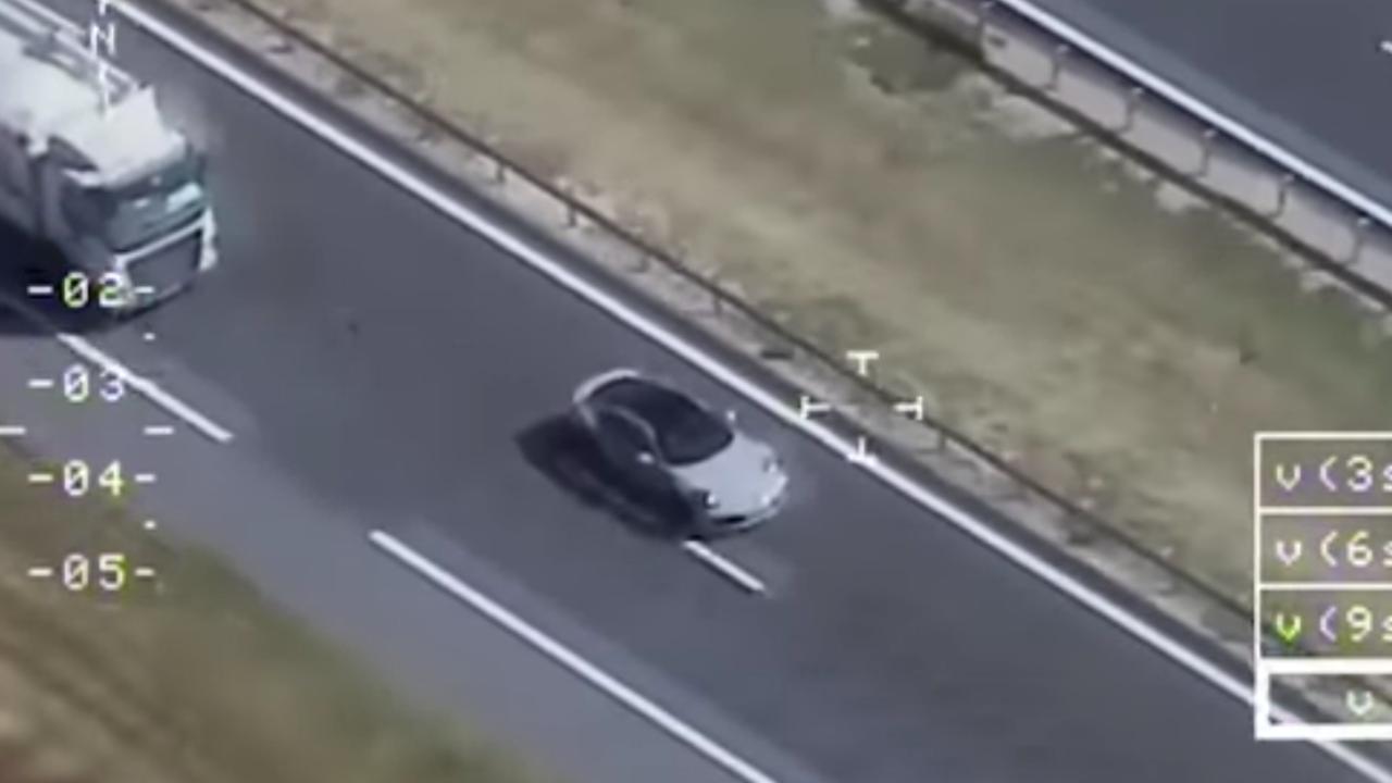 Helicopter footage of the Porsche shows it passing traffic at speed. Picture: Guardia Civil