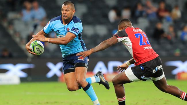 Kurtley Beale takes on the Lions’ Wandisile Simelane during their Super Rugby match at Bankwest Stadium in February. Picture: AFP