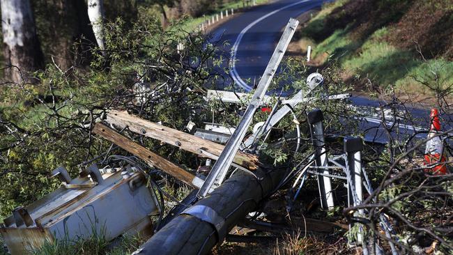 Power pole damaged after storm at Wilmot Road near Forth. PICTURE CHRIS KIDD