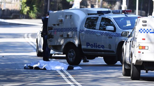 A body is seen on on the road in Forest Lodge. Picture: Dean Lewins