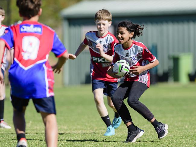 Bella Miller with the ball for Bunkers Hill State School in the inaugural Primary Interschools Reconciliation Touch Carnival hosted by Glenvale State School, Wednesday, May 28, 2025. Picture: Kevin Farmer