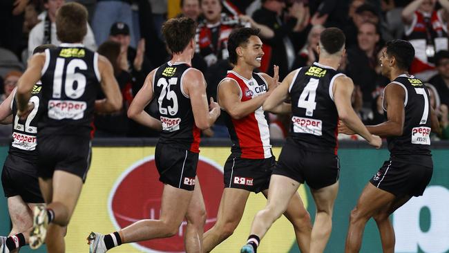 Teammates run to Mitch Owens after he kicks a goal at Marvel Stadium. Picture: Darrian Traynor/Getty Images