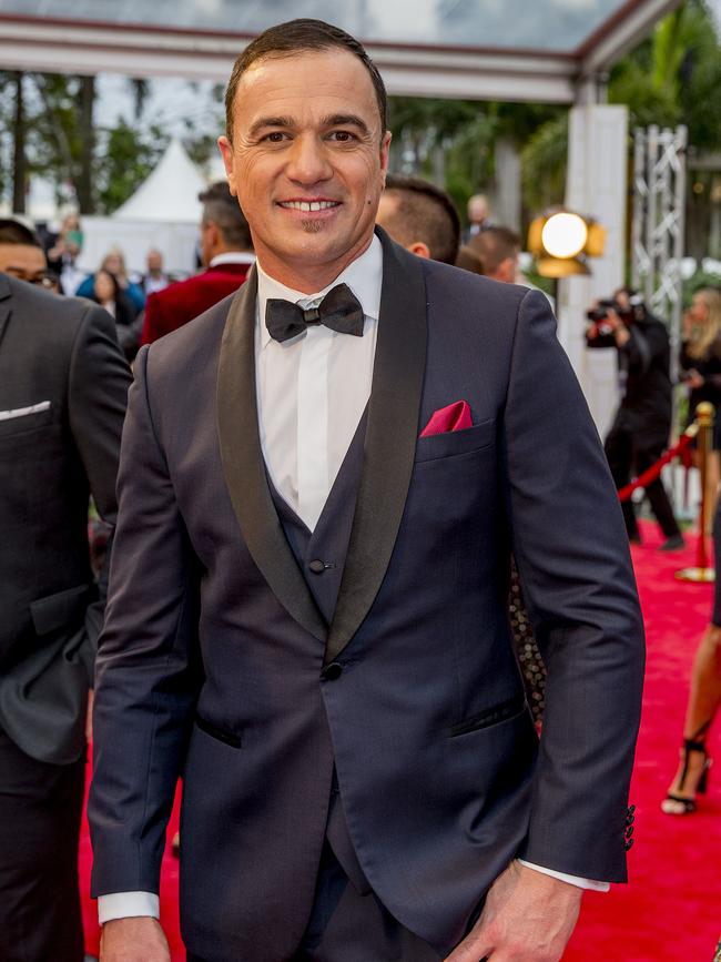 Shannon ‘Nollsie’ Noll scrubbing up nicely in a tailored navy suit. Picture: Jerad Williams