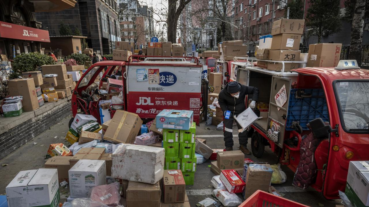 Boxes piled up in the streets of Beijing indicate a struggling supply chain. Picture: Kevin Frayer / Getty Images.