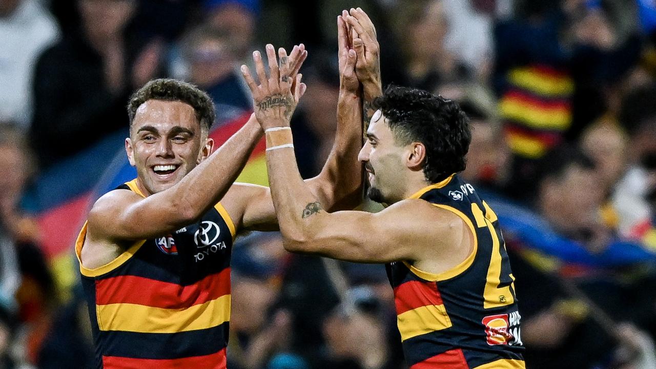 Lachlan Sholl celebrates a goal with Izak Rankine. (Photo by Mark Brake/Getty Images)