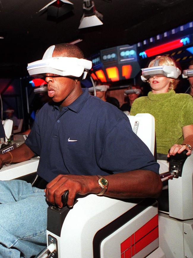 Punters on the virtual reality ride at Sega World.