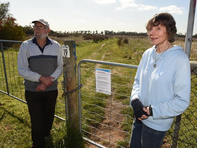 Wetlands friends group members Rex Chugg and Robin Clarey at a locked gate to the wetlands. Picture: Chris Eastman