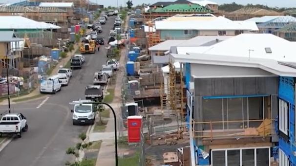 Portaloo toilets line a construction street at Shoreline, where there is no sewerage system yet. The state will allocate $200 million in this month’s budget to build infrastructure and crack open developers’ land banks. WATCH THE VIDEO