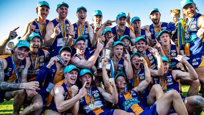 Golden Square celebrates its thrilling win over Sandhurst in the Bendigo league grand final at the QEO. Picture: SAA Imaging