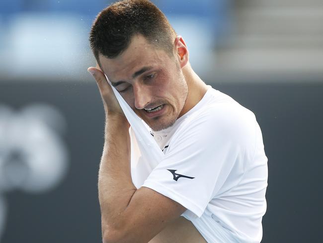 MELBOURNE, AUSTRALIA - JANUARY 14: Bernard Tomic of Australia reacts in his match against Denis Kudla of the USA during 2020 Australian Open Qualifying at Melbourne Park on January 14, 2020 in Melbourne, Australia. (Photo by Daniel Pockett/Getty Images)