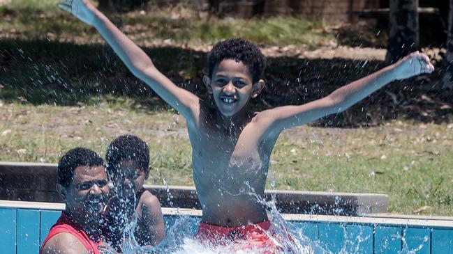 Abeya, Naol and Leti cool down at Knox Leisureworks. Knox Council has announced plans to build a new outdoor leisure play park at the centre. Picture: Mark Dadswell