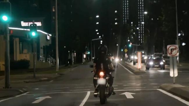 The man riding his motorbike through Surfers Paradise. Credit: VICE