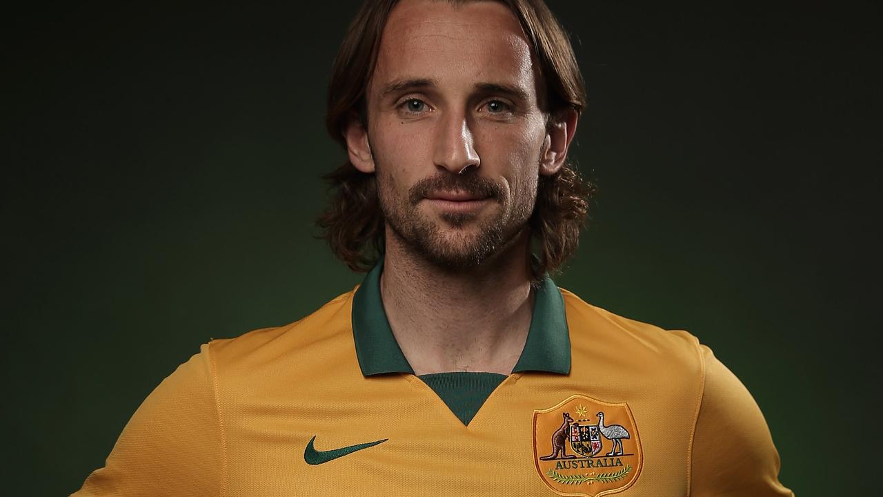 SYDNEY, AUSTRALIA - MAY 23: Josh Kennedy of the Socceroos poses during an Australian Socceroos portrait session at the Intercontinental on May 23, 2014 in Sydney, Australia. (Photo by Cameron Spencer/Getty Images)