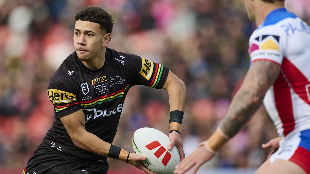 PENRITH, AUSTRALIA - AUGUST 04: Isaiah Iongi of the Panthers runs the ball during the round 22 NRL match between Penrith Panthers and Newcastle Knights at BlueBet Stadium, on August 04, 2024, in Penrith, Australia. (Photo by Brett Hemmings/Getty Images)