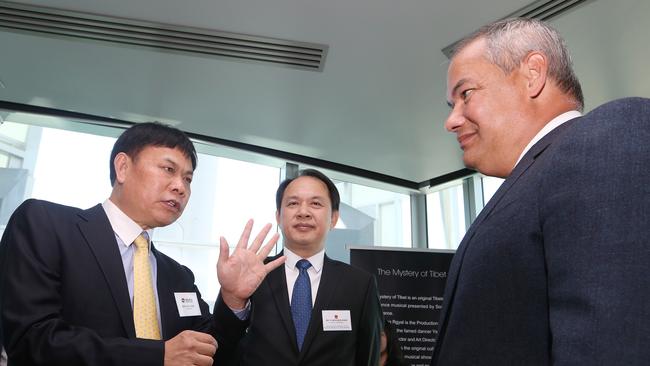 Songcheng Group Chairman Qiaoling Huang talks with Chinese Consul-General Dr Yongchen Zhao and Mayor Tom Tate. Picture Glenn Hampson