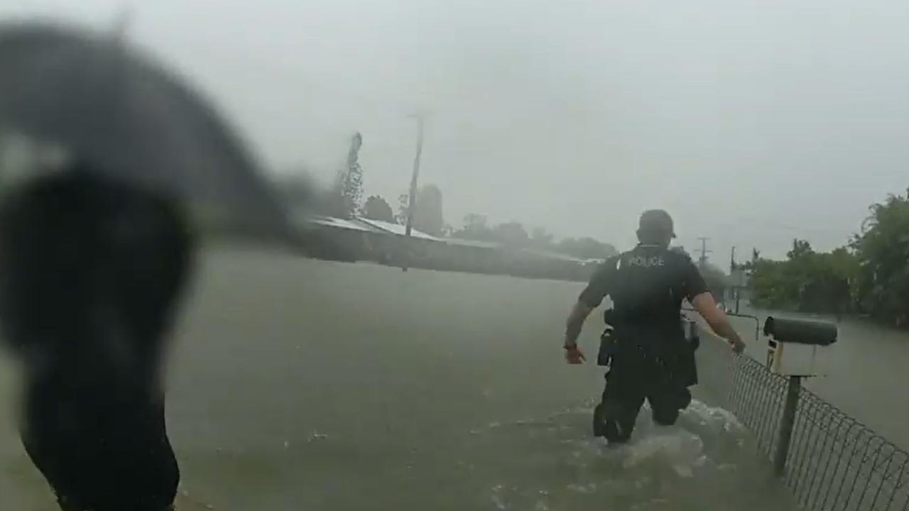 Officers from Edmonton and Gordonvale Stations helped rescue two people from flood waters at Klarwein Close. Picture: QPS.