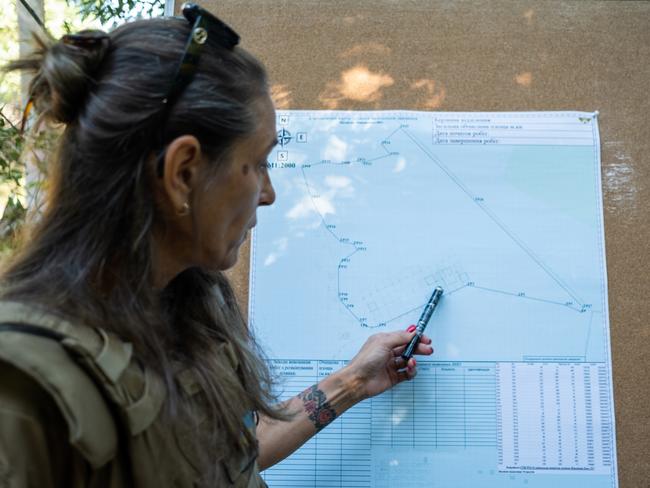 Ryta Mazankova points out areas cleared of ordnance. Picture: Mauricio Gris