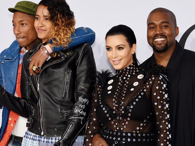 NEW YORK, NY - JUNE 01: (L-R) Pharrell Williams, Helen Lasichanh, Kim Kardashian and Kanye West attend the 2015 CFDA Fashion Awards at Alice Tully Hall at Lincoln Center on June 1, 2015 in New York City. Dimitrios Kambouris/Getty Images/AFP == FOR NEWSPAPERS, INTERNET, TELCOS & TELEVISION USE ONLY ==