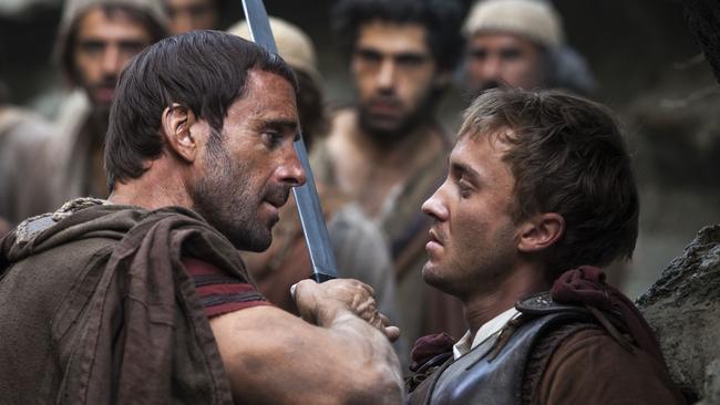 Joseph Fiennes and Tom Felton in a scene from film Risen. Picture: Supplied