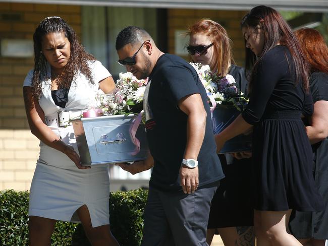 Devastated family members carrying Tateolena’s coffin at her funeral. Picture: Bradley Hunter