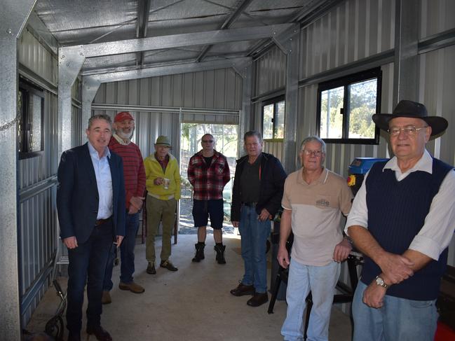 MEN'S BUSINESS: Page MP Kevin Hogan with members of the Dunoon Men's Shed in the shed's extension