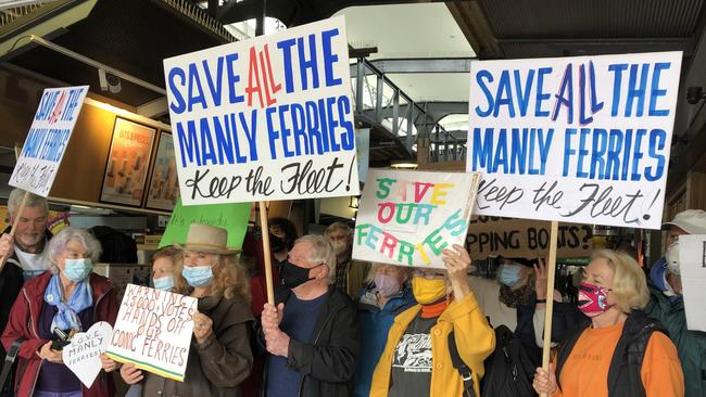 Dozens of Save the Manly Ferries protesters at Manly Wharf just before the Queenscliff made her last public voyage. Picture: Jim O'Rourke