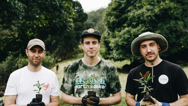 Australian hard rock band In Hearts Wake plant trees to offset carbon emissions of new record. PIcture: Supplied.