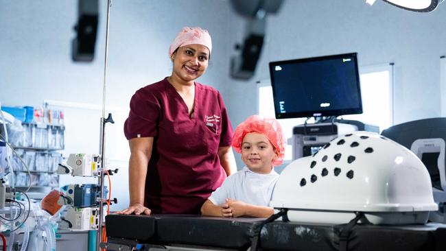 Dr Janani Krishnan and Kruze Bott with the da Vinci Xi surgical assist robot. Picture: Mater Private Hospital Townsville