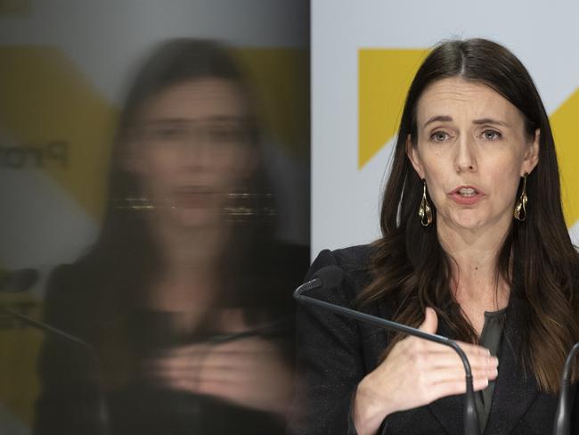 WELLINGTON, NEW ZEALAND - NOVEMBER 22: Prime Minister Jacinda Ardern speaks during the post-Cabinet press conference with director general of health Dr Ashley Bloomfield at the Beehive, Parliament, on November 22, 2021 in Wellington, New Zealand. Prime Minister Jacinda Ardern has announced all of New Zealand will move into the COVID-19 Protection Framework from 11.59 pm on Thursday 2 December. The framework, known as the traffic light system, will have different restrictions depending on whether regions are at red, orange or green settings. (Photo by Mark Mitchell - Pool/Getty Images)