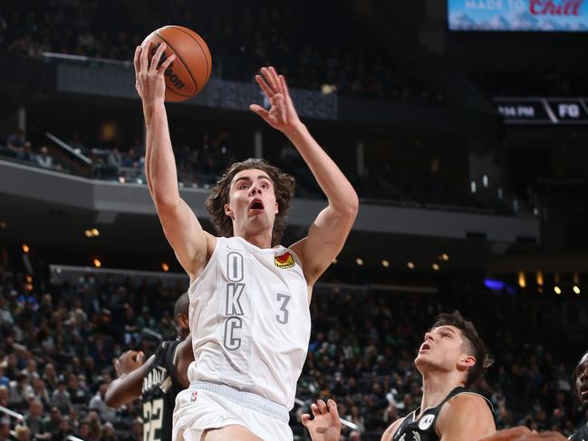 Josh Giddey of the Oklahoma City Thunder shoots against the Milwaukee Bucks during a NBA clash in Wisconsin. Photo: Getty Images