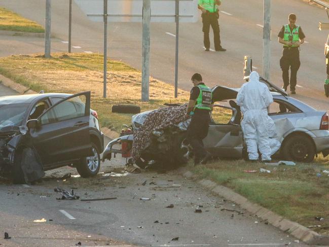 Police investigate the scene of a horror crash on Trower Rd at Lakeside Drv overnight. Picture Glenn Campbell