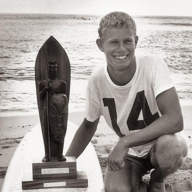 Champion Australian surfer Bernard 'Midget' Farrelly with his Makaha trophy as seen in the TV documentary Men of Foam &amp; Wood. Supplied by Foxtel.