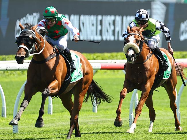 SYDNEY, AUSTRALIA - JANUARY 04: Reece Jones riding Autumnmation win Race 6 TAB  during Sydney Racing at Royal Randwick Racecourse on January 04, 2025 in Sydney, Australia. (Photo by Jeremy Ng/Getty Images)