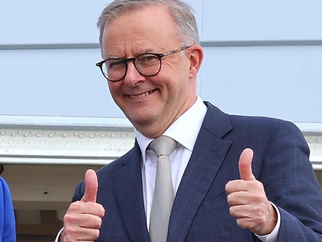 CANBERRA, AUSTRALIA - MAY 23: Prime Minister Anthony Albanese stands with newly appointed Foreign Minister Penny Wong, at the door of their plane on May 23, 2022 in Canberra, Australia. Albanese is travelling to Japan to attend the QUAD Leaders' meeting in Tokyo. Albanese was sworn in as Australia's 31st prime minister on Monday morning following his victory over Scott Morrison in the federal election on Saturday. (Photo by David Gray/Getty Images)