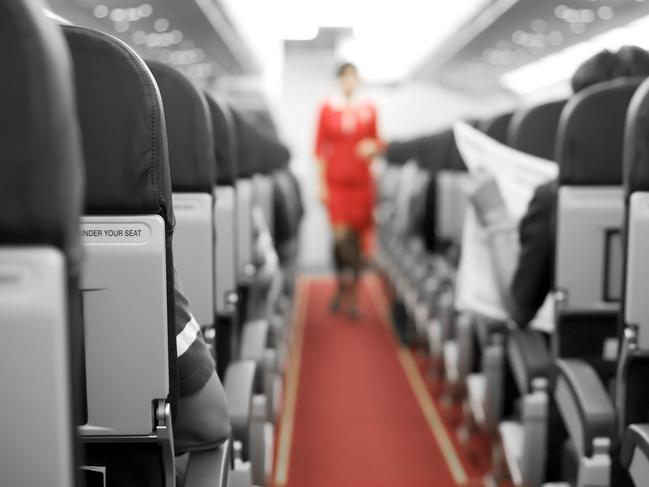 ESCAPE: TIGHT_TRAVELLER, Angus Kidman- 10MAR19- Air Travel with seats and cabin crew in background - Inside the plane Picture: iStock