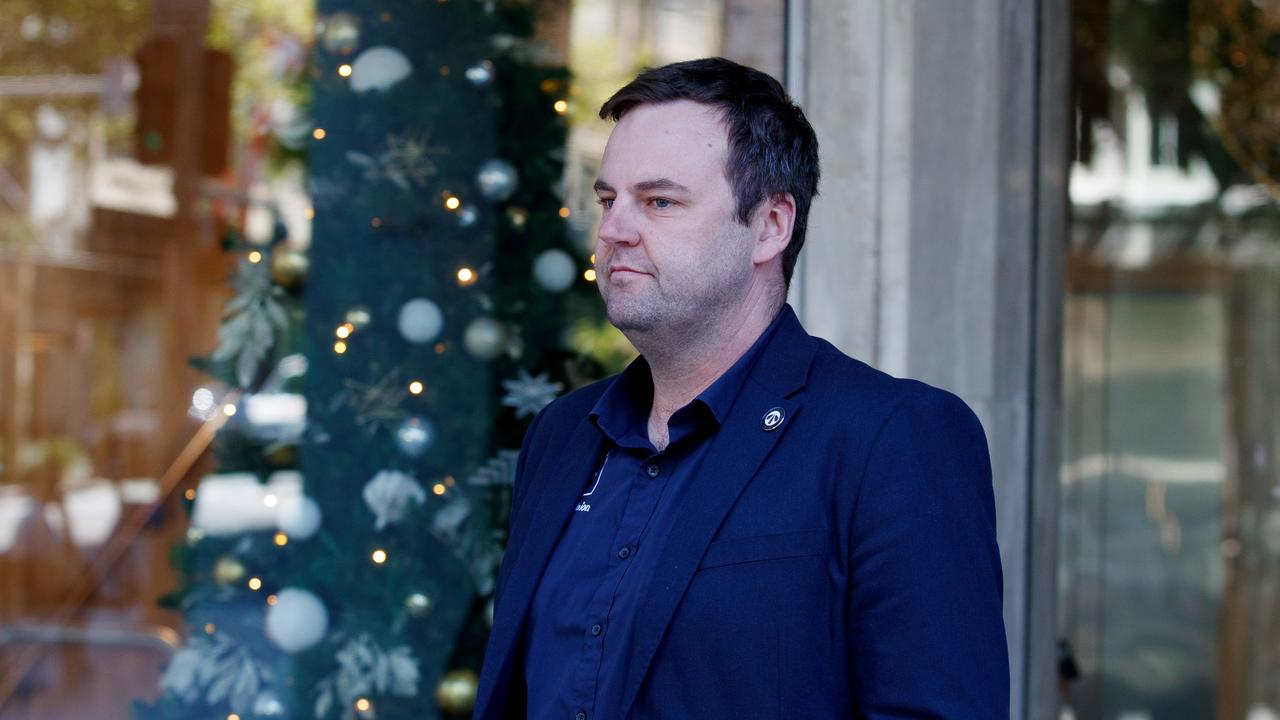 RTBU NSW Secretary Toby Warnes and delegates leave the Fair Work Commission on Christmas Eve after an application to suspend or terminate rail union strikes which the NSW Government claims will endanger the safety of millions. Picture: NewsWire / Nikki Short