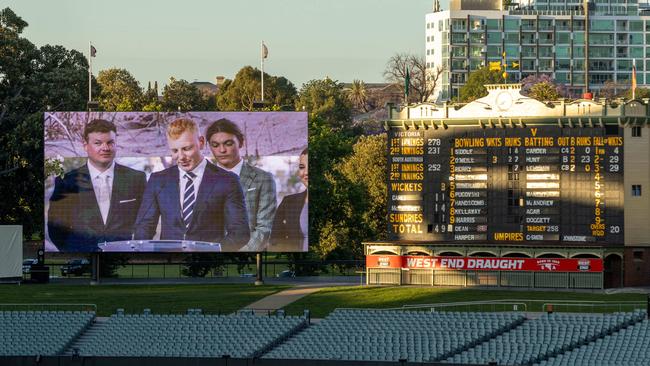 Charlie Stevens’ brothers are seen on the big screen at Adelaide Oval. Picture: Ben Clark