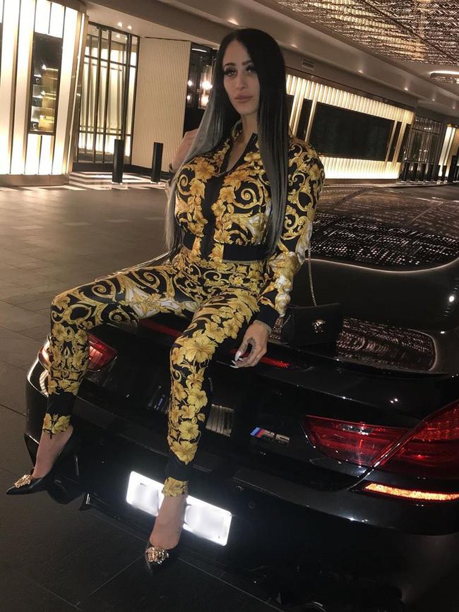 Dressed head to toe in Versace.